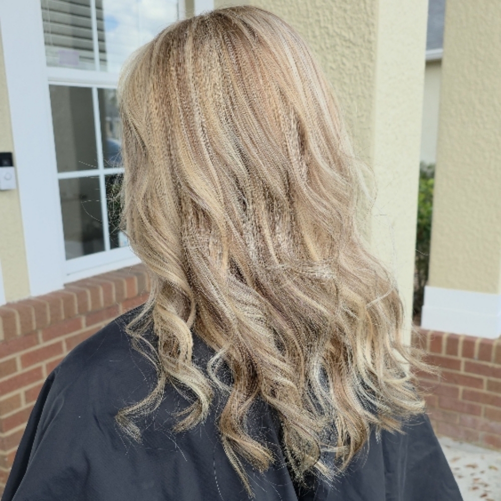 Haircut and Blow dry Medium at Shear Divination in Wesley Chapel, FL