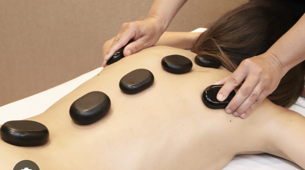 Relaxing Hot Stone Massage at Sayda Franco Health and Wellness in Bloomingdale, IL