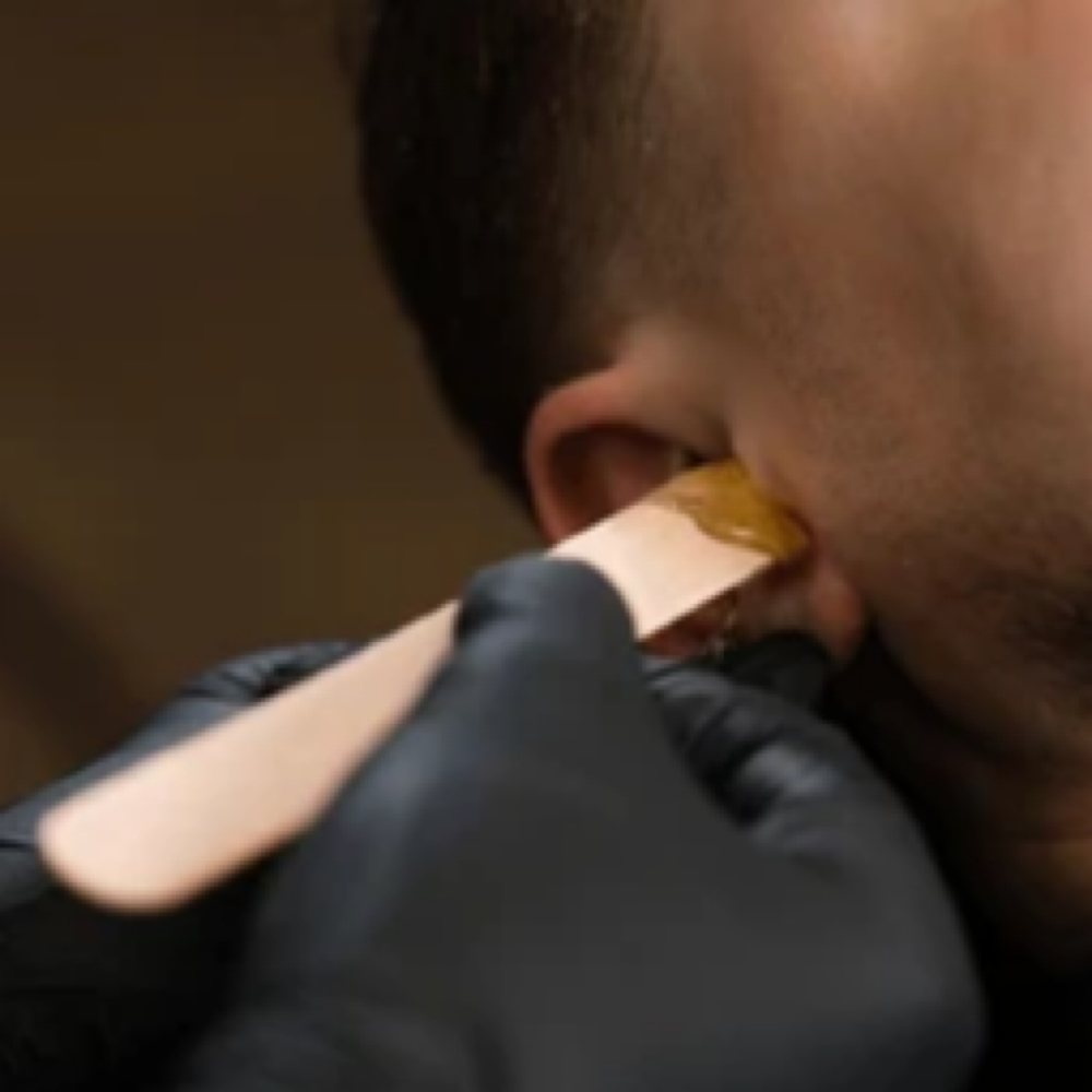 Ear waxing at EDGE District Barber Studio in St Petersburg, FL