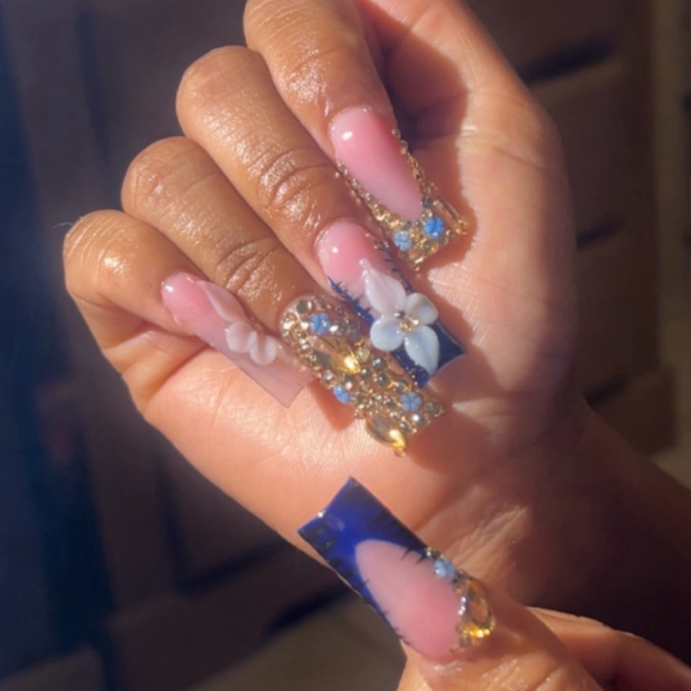 Long French Tip & Blinged at Unique Nails Studio in Winston Salem, NC