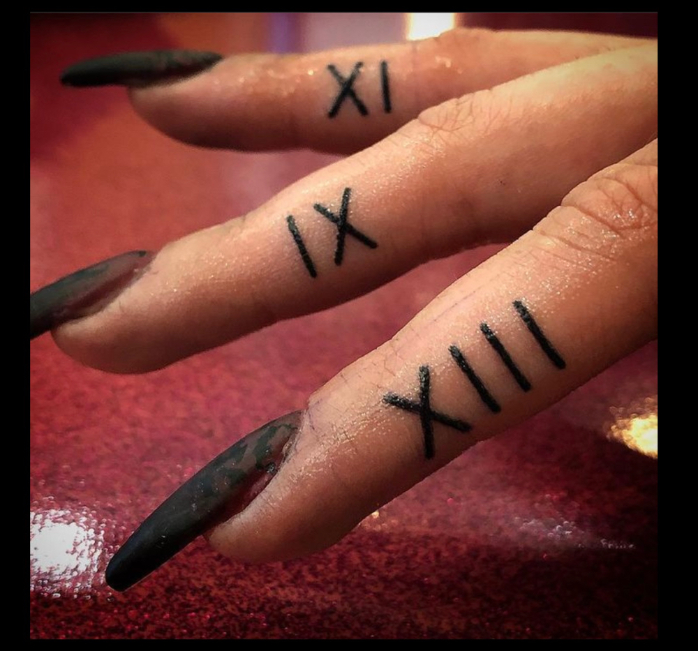 Finger Tattoo(s)