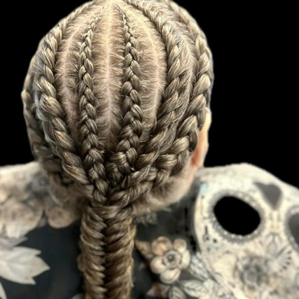 Braiding at Kiki’s Beauty Service in Fairview, MI