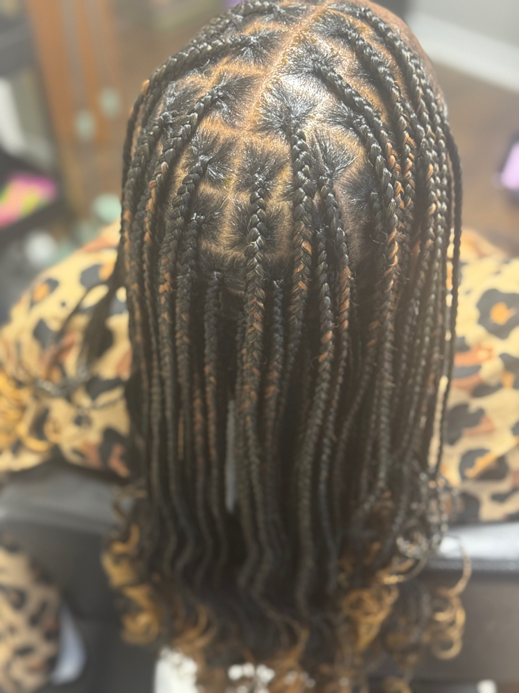 Small Knotless Braids at BluDiamond Braids in Fort Pierce, FL