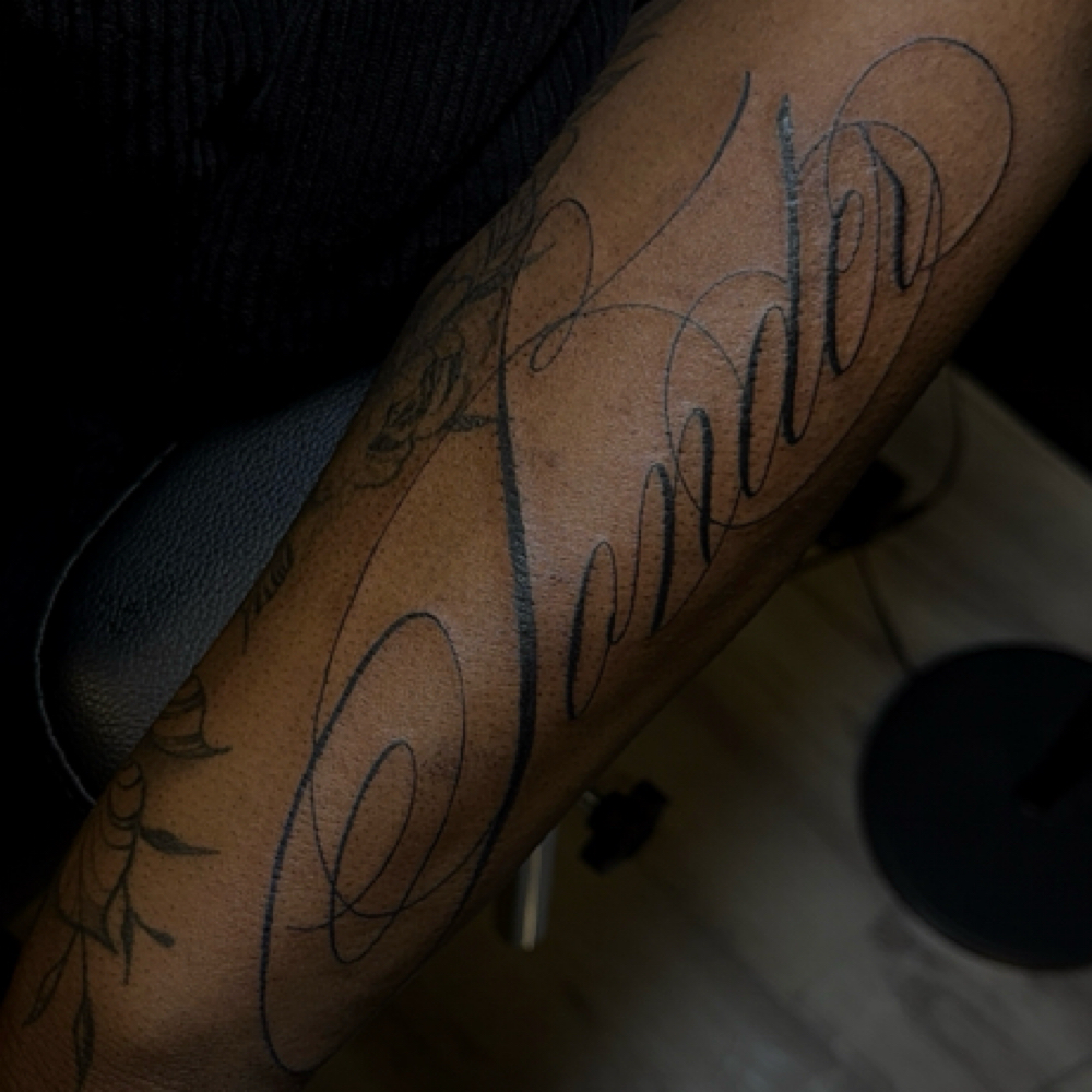 Scrpit Tattoo at TatsByBlu in Milwaukee, WI