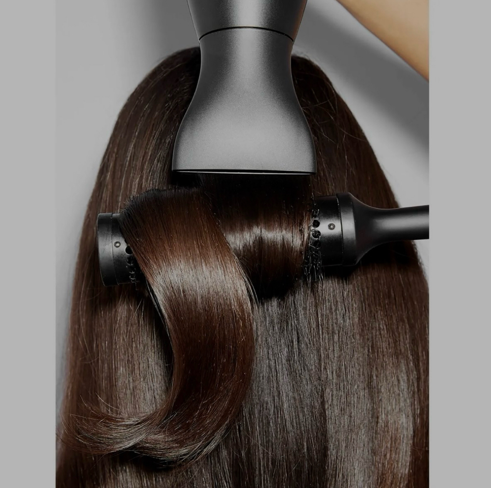 Signature Layered Cut & Blowout at Define Beauty Hair studio in Lake Mary, FL