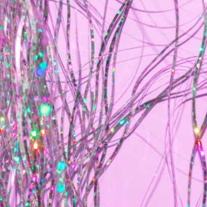 Tinsel/Feather Clip In at Flourish Health & Wellness in Howard City, MI