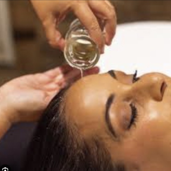 Aroma Therapy Oil Scalp Massage at Bliss Beauty Bar in Houston, TX