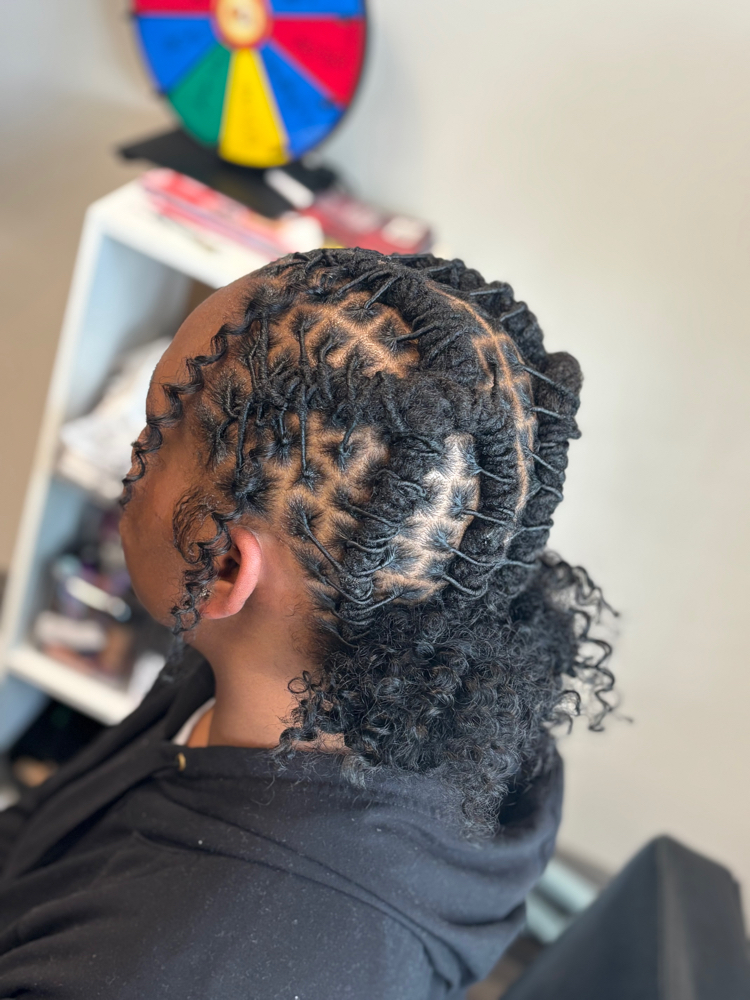 Loc Goddess Bun at LocsNLooks in Lawrenceville, GA