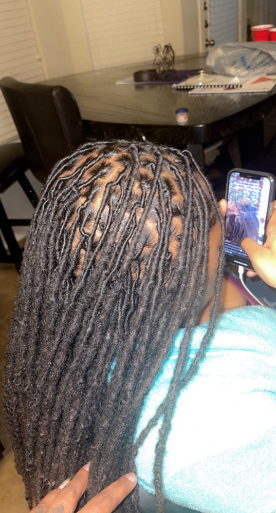 Loc/Retwist Service