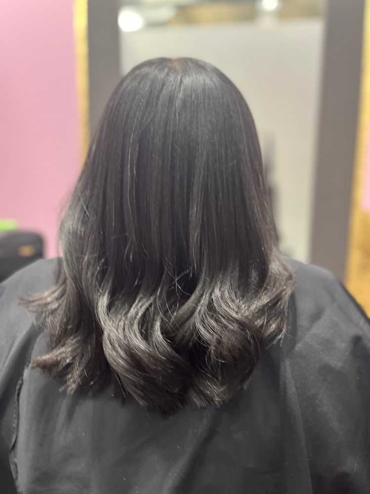 Silk Press + Trim at Crown & Silk Salon in Durham, NC