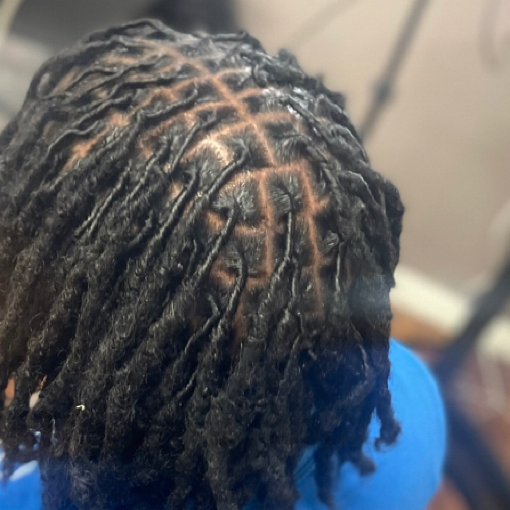 Kiddi Lock Retwist(4-12) at Bella Braids By Keesh, LLC 💎 in Folkston, GA