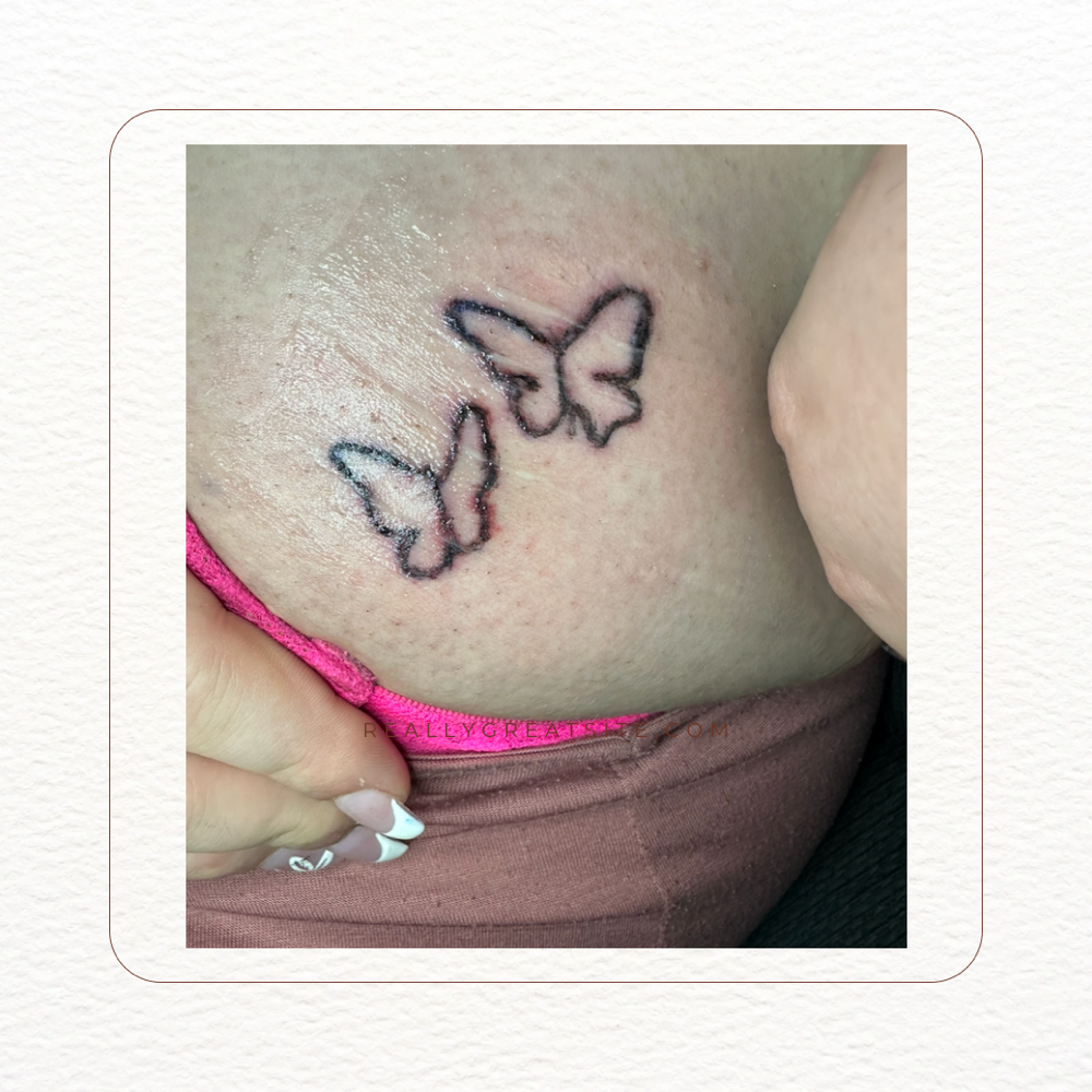 Fine Line Tattoo