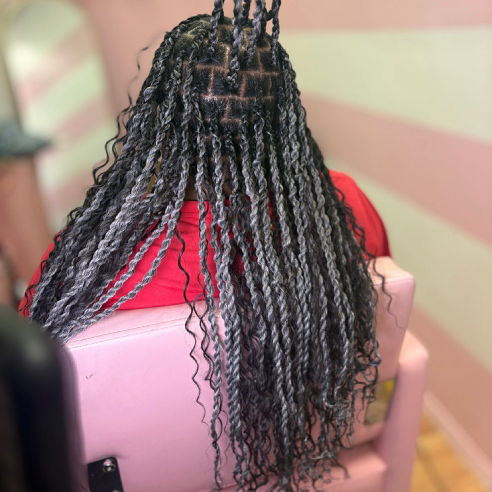 Small Twist (Weave Added) at Crowned Beauty Studios LLC in Detroit, MI
