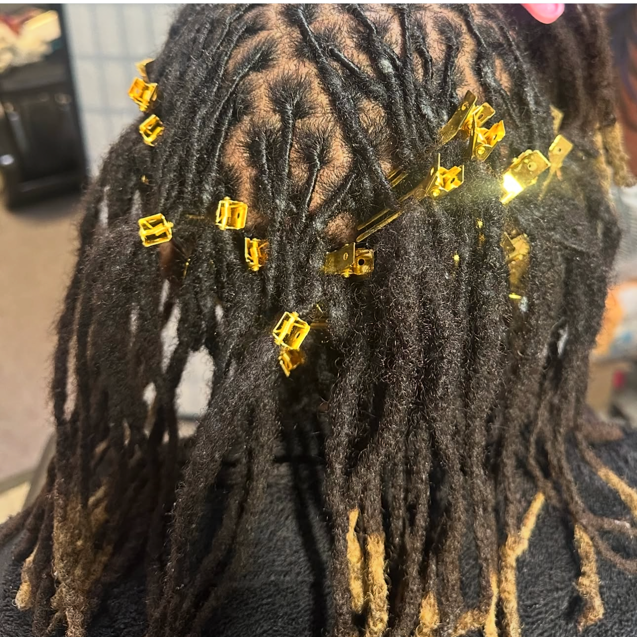 Loc Retwist at Color Whipped Hair Studios in Youngstown, OH