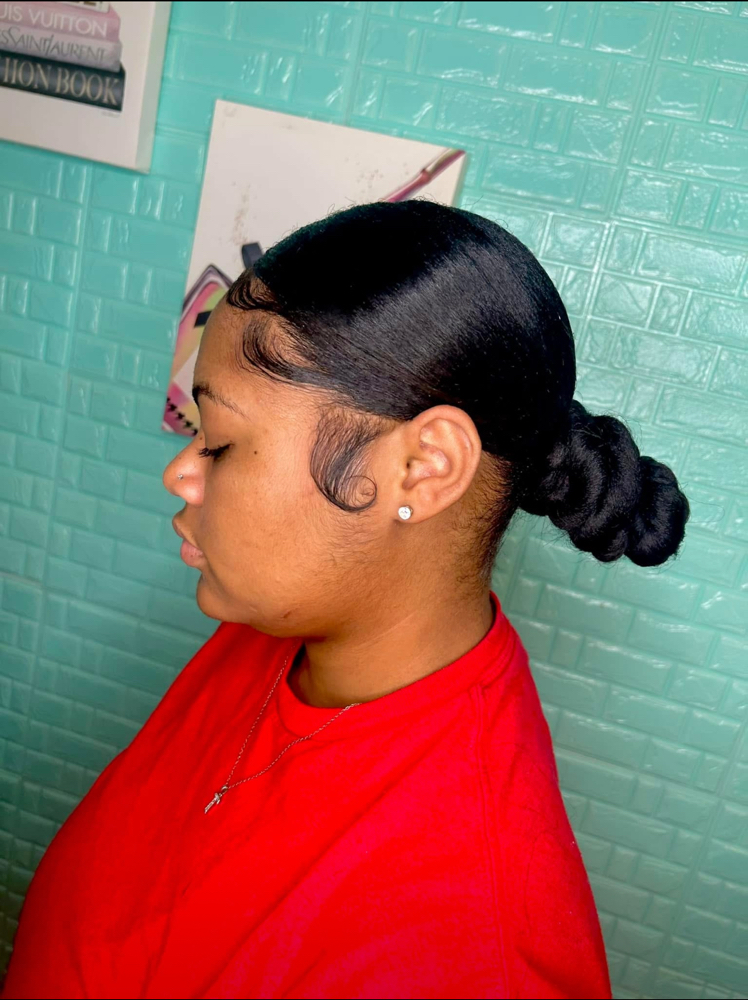 Slick Bun at Lyric Gifted Hands in Carson, MS