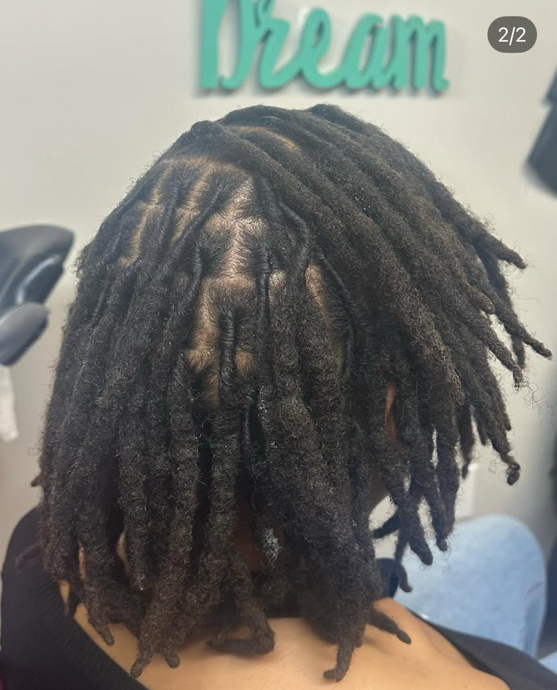 Palm Roll Retwist (Full Head) at Beauty Blvd in Columbus, OH