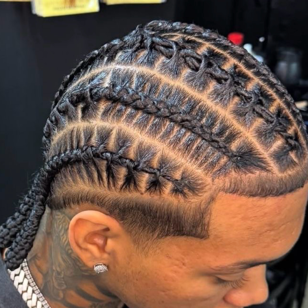 Men’s Half Cornrows Half Barrel 4-8 at Impeccable Beauty in Clarksville, TN