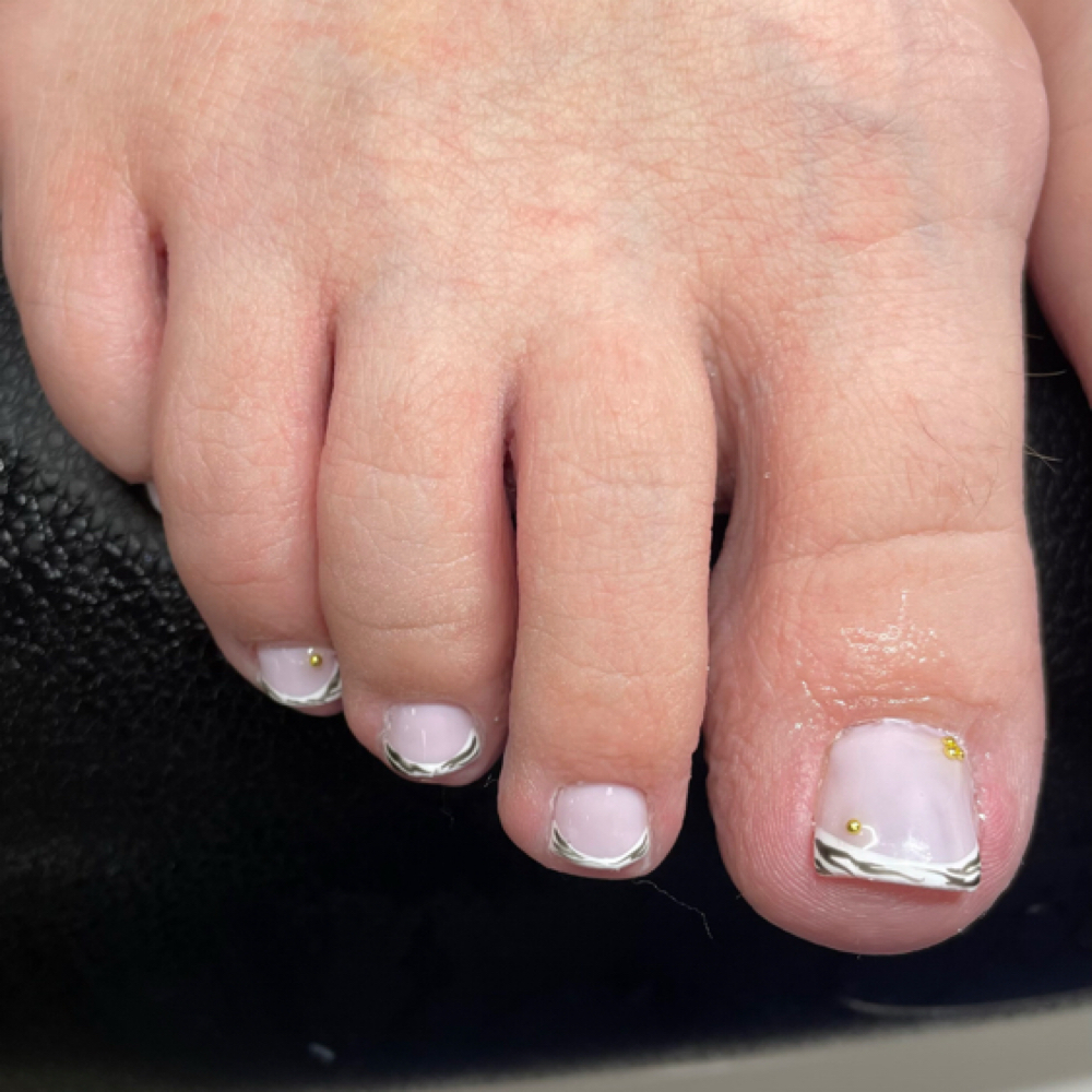 Luxury Pedi at Elite Salon Co in Great Bend, KS