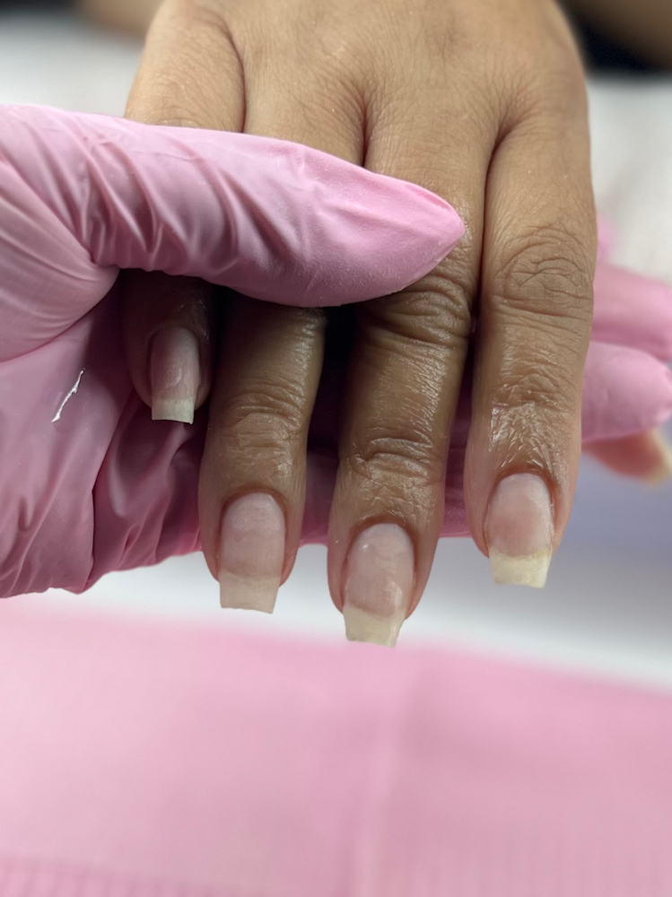 Unisex Deep Cuticle Manicure at Studio360 Nails & Barber Co. by Naniinailedit in Tampa, FL
