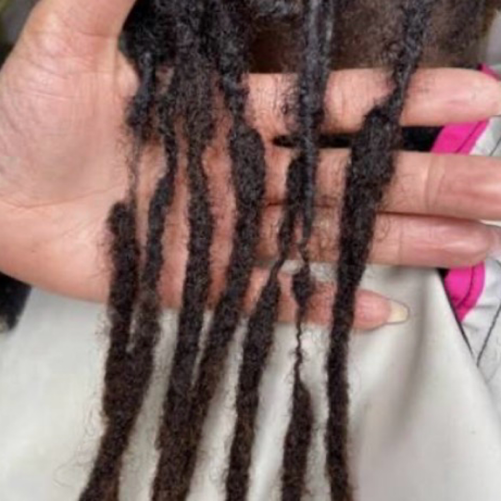 Loc Repair at Melanin Beauty Bar LLC in Greenbelt, MD