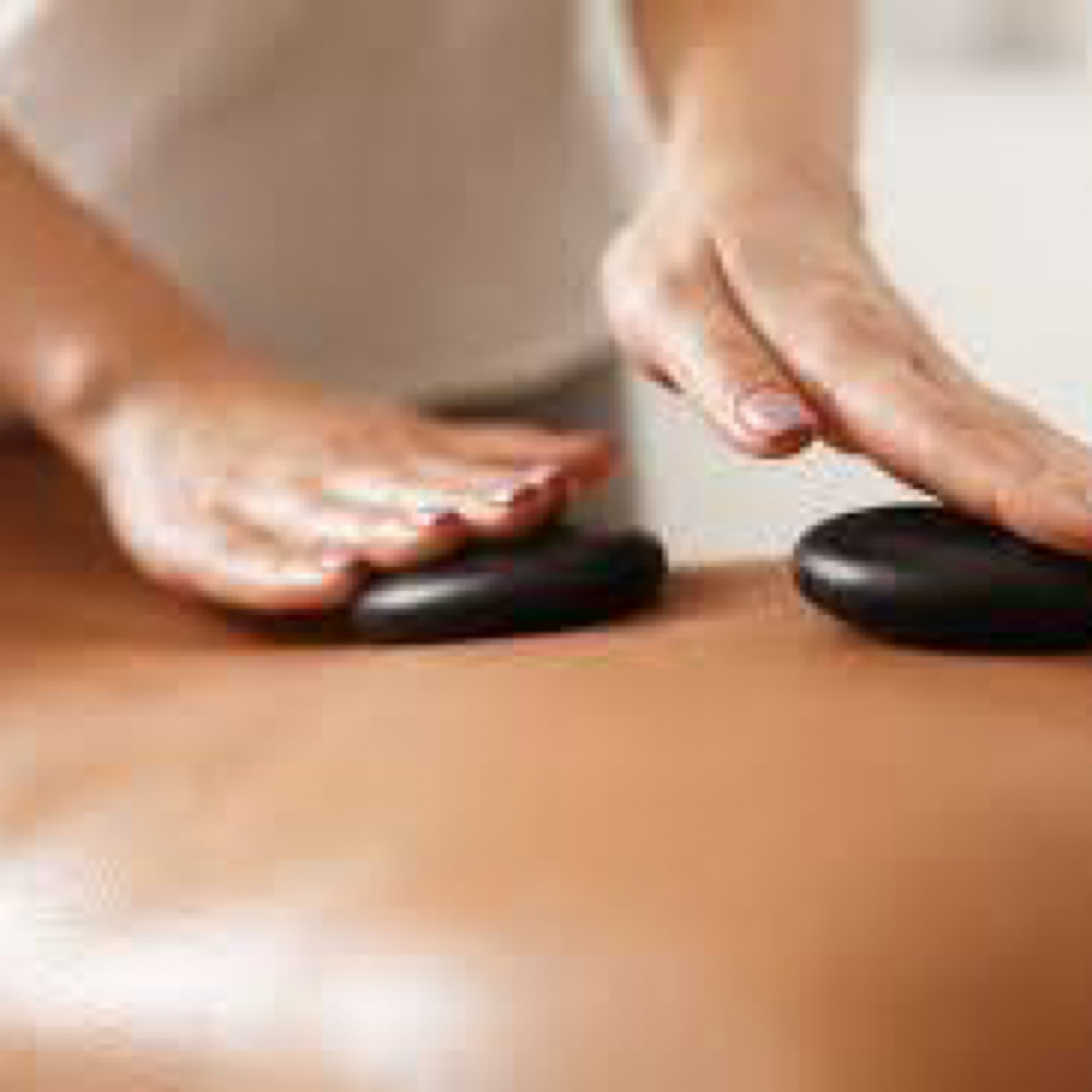 Hot Stone Massage at Cedar & Sage Massage and Wellness in Birnamwood, WI