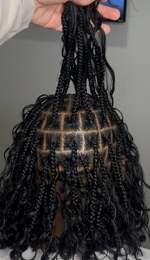 Smedium Boho Knotless Braids at Dolled By Sky in Chicago, IL