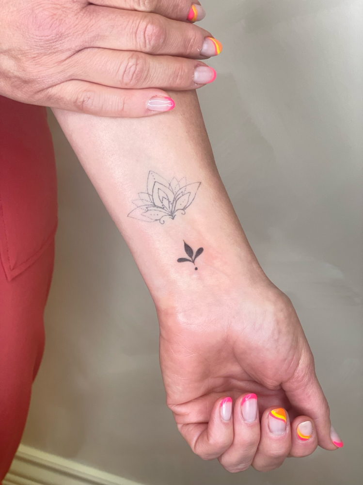 Fine Line Tattoo