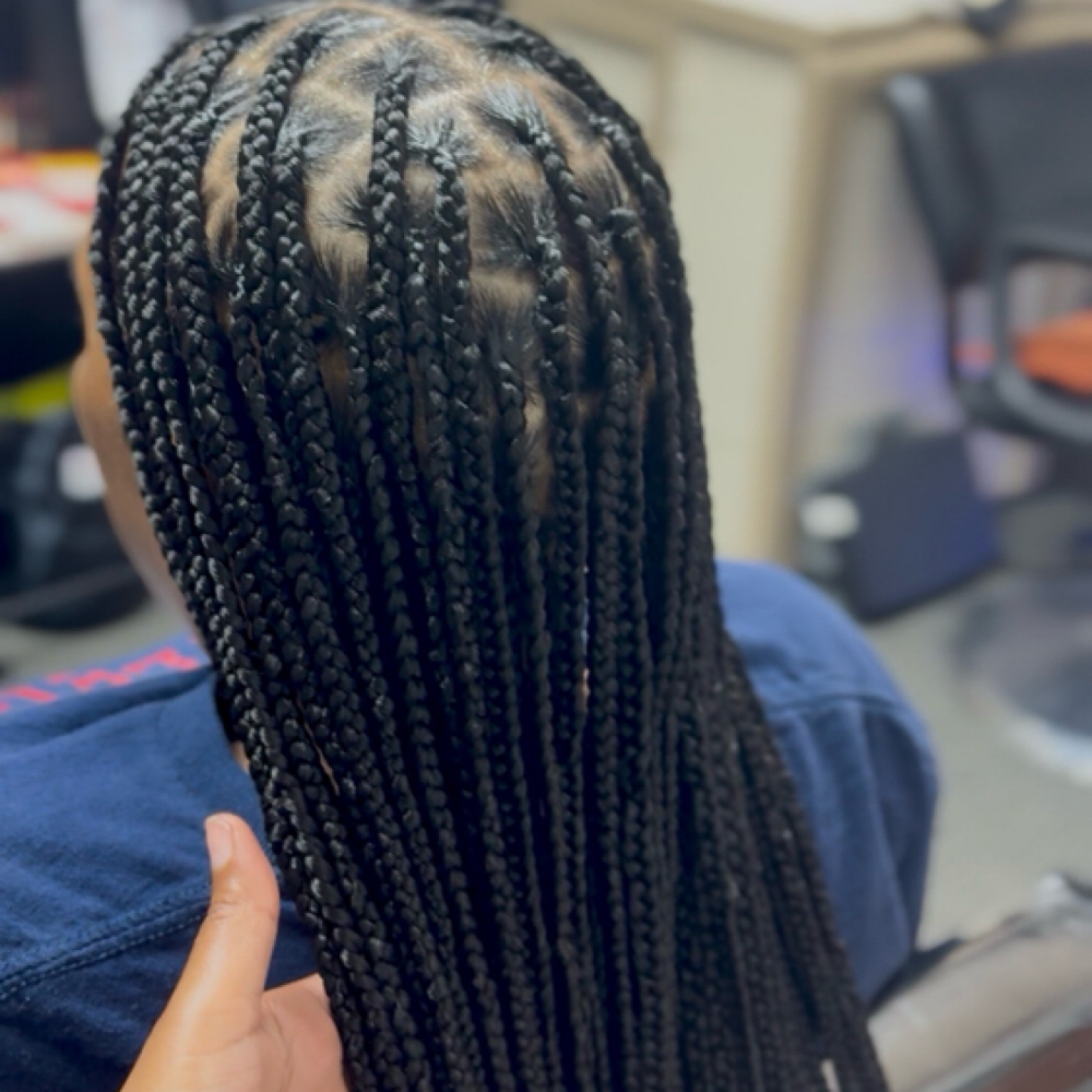 Smedium Knotless Braids at Goddesss Hair Vault in Houston, TX