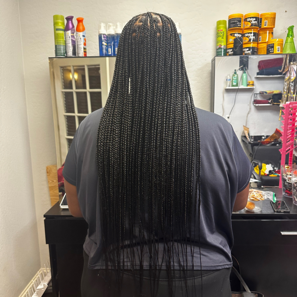 Medium Knotless Braid Butt Length at Berdy African hair braiding LLC in Chandler, AZ
