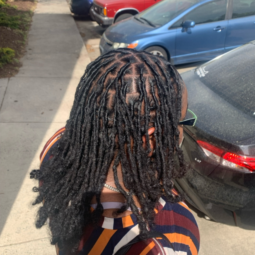 Loc Retwist at Glamour Touch by Che' in Durham, NC