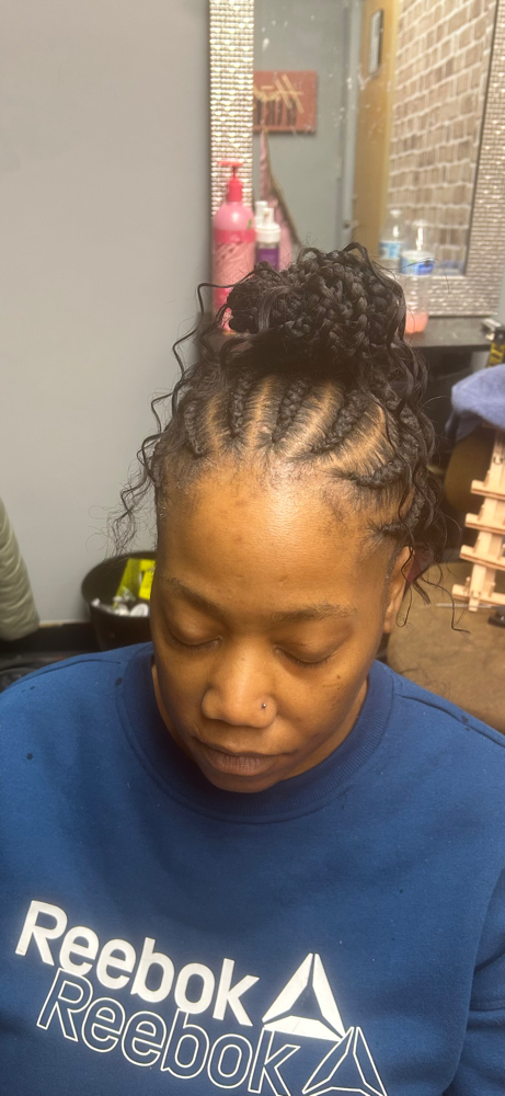 Big Feed Ins Into Bun Or Pony at Deja’s Divine Hair Company in Joliet, IL