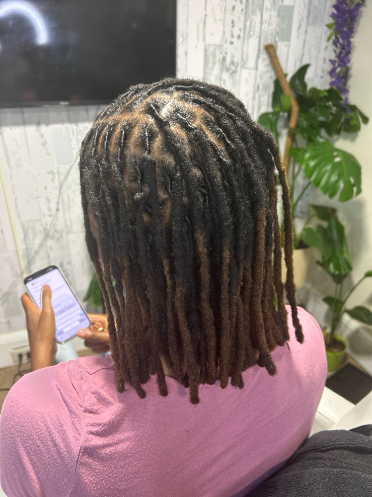 Loc Retwist (Shoulder Length & Under) at Magnified looks in Douglasville, GA