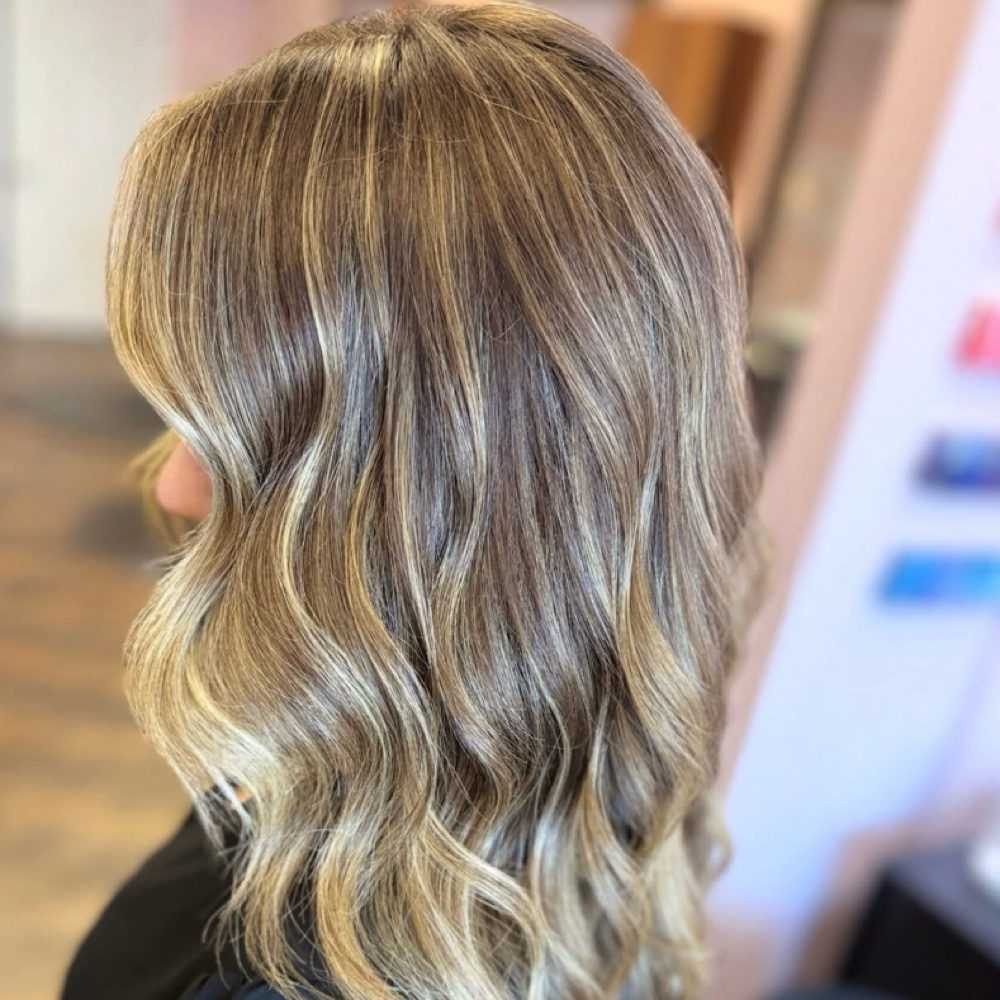 Gloss & Cut at Mane Beauty Bar in Englewood, FL