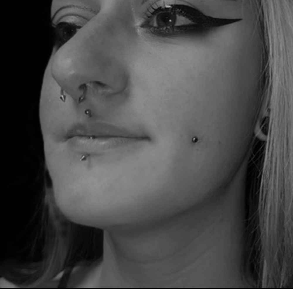 Dimple Piercings at Alexandra  Ford in Dallas, TX