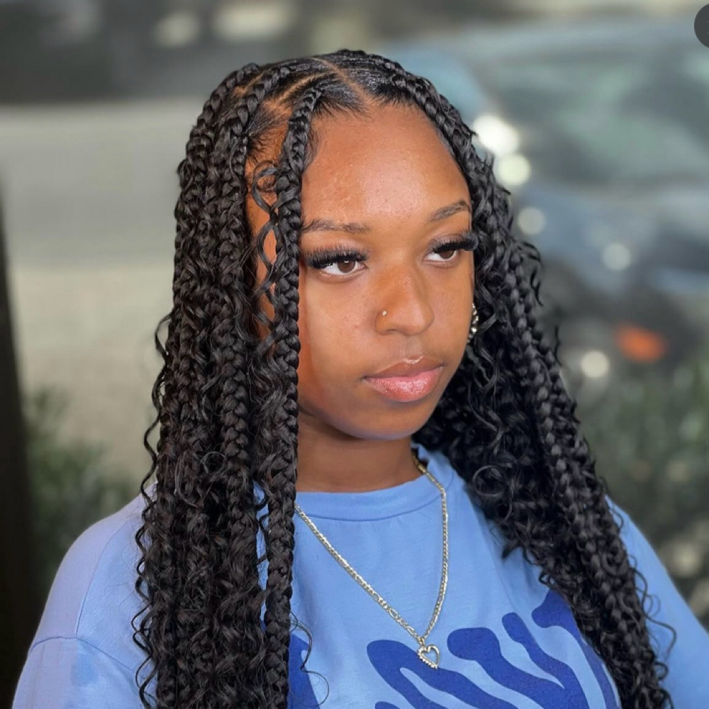 Large Boho Knotless at Rooted crowns beauty lounge in Tampa, FL