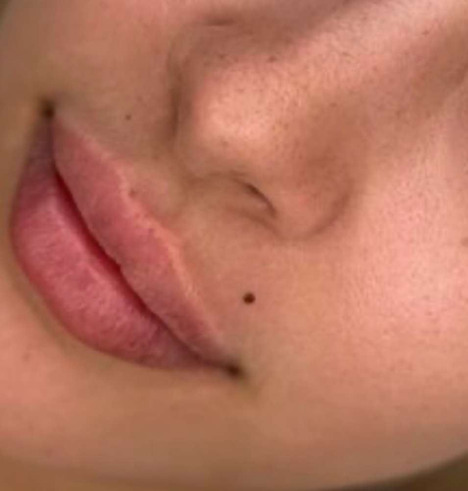 Beauty Mark Tattoo