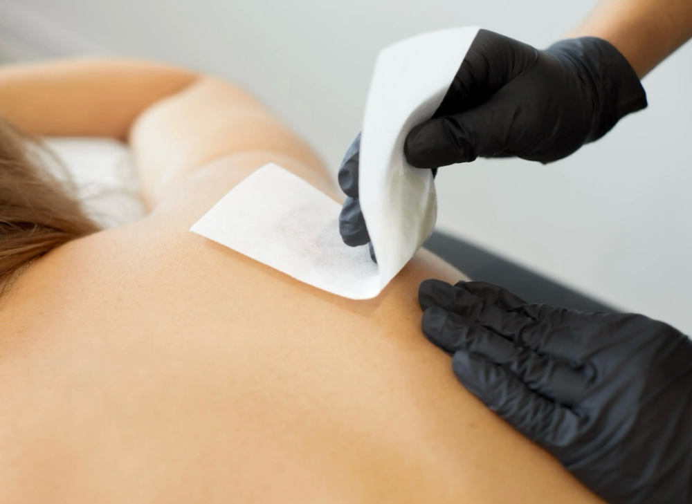 Back Wax at AJ Esthetics in Angola, NY
