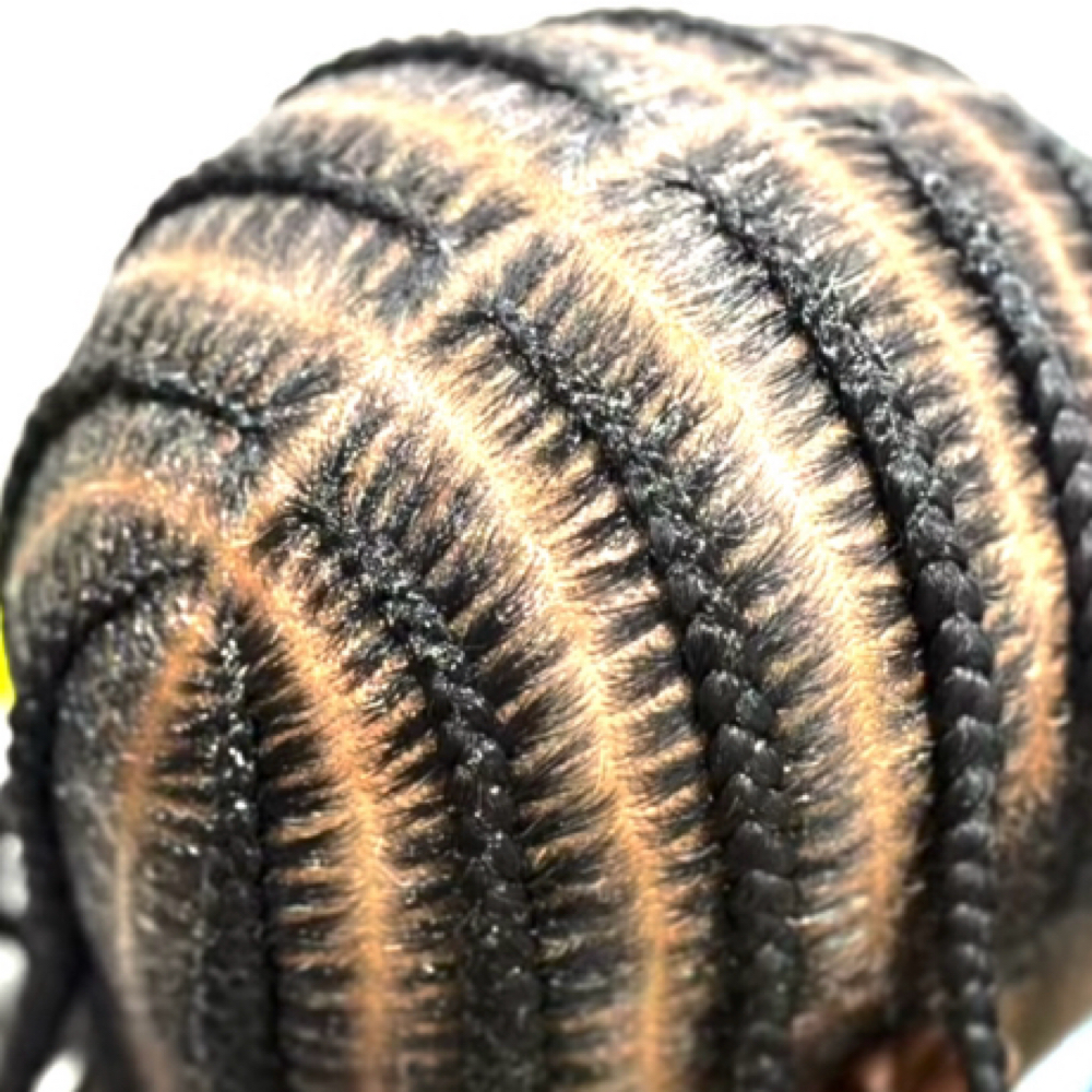6-8 Stich Cornrows at Yunis hair braiding in Belleville, MI