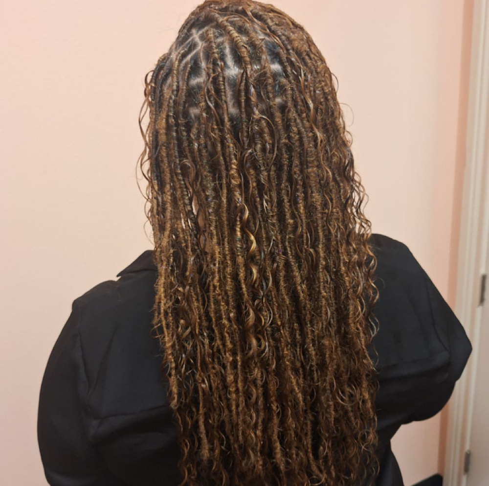 Faux Locs – Medium (Mid-Back) at WestAfrican Beauty Junction Braids in Prosper, TX