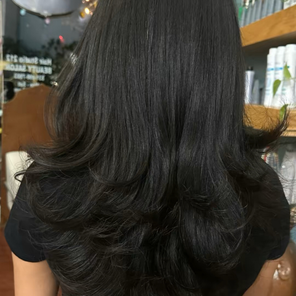 medium-length layered cut at Hair studio 212 in Salinas, CA