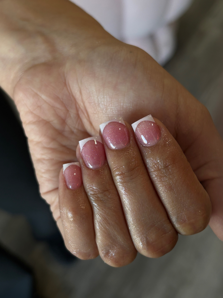 White Tips With Clear Acrylic at Destinee Caballero in Lubbock, TX