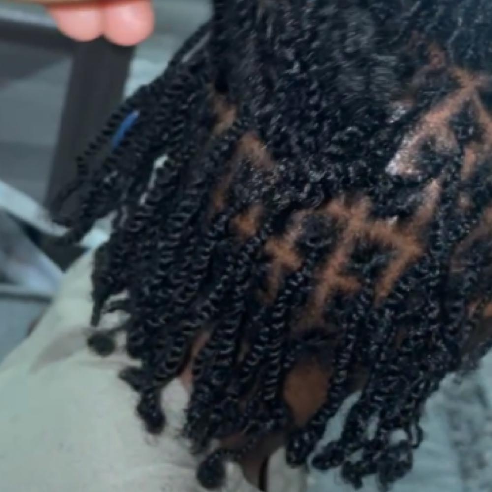 Sister Loc Retie at Haute Hair Studio in Fairfield, OH