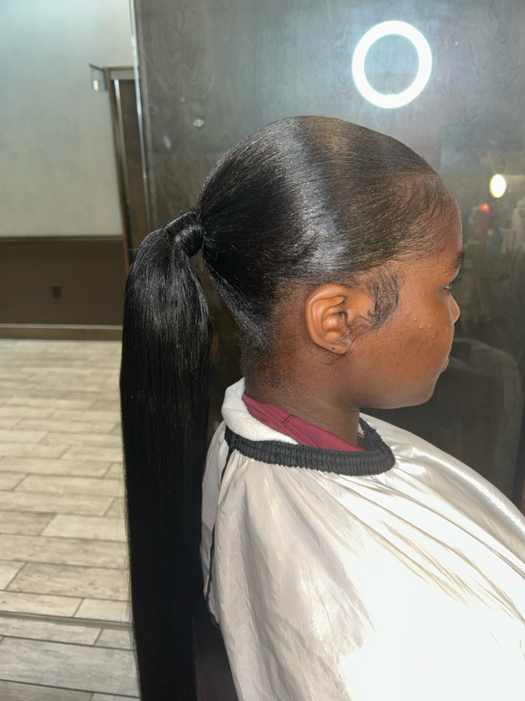 Sleek ponytail at KayShineHairPro in Shaker Heights, OH