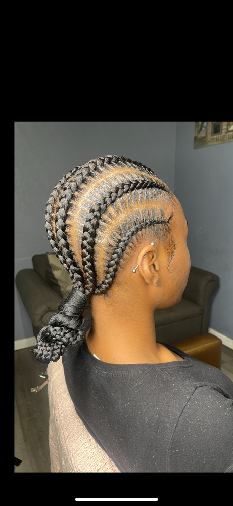 Stitch Braids Bun at HAIRBYREYA in Monroeville, AL