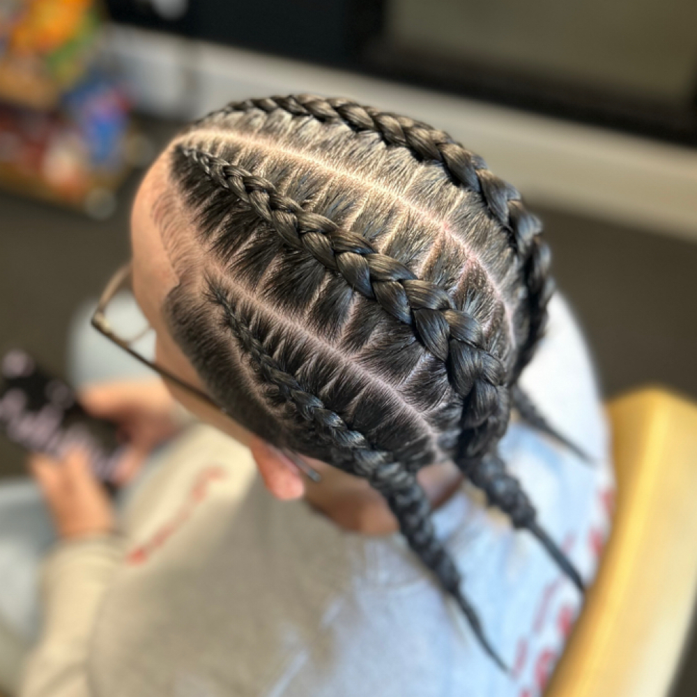 Man Bun 4 Braids at Juicy Braidz in San Diego, CA