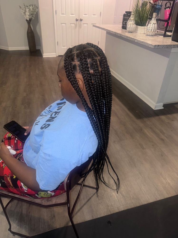 Large Knotless Braids at Braided By UNeeQ in Moundville, AL