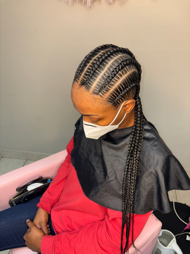 4-6 Stitch Braids (Weave Added) at Crowned Beauty Studios LLC in Detroit, MI