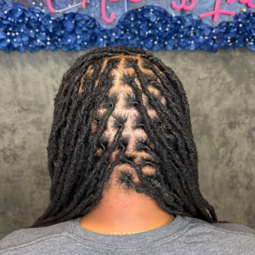 Loc Maintenance (palm roll) at Curl Access Inc Salon in Snellville, GA