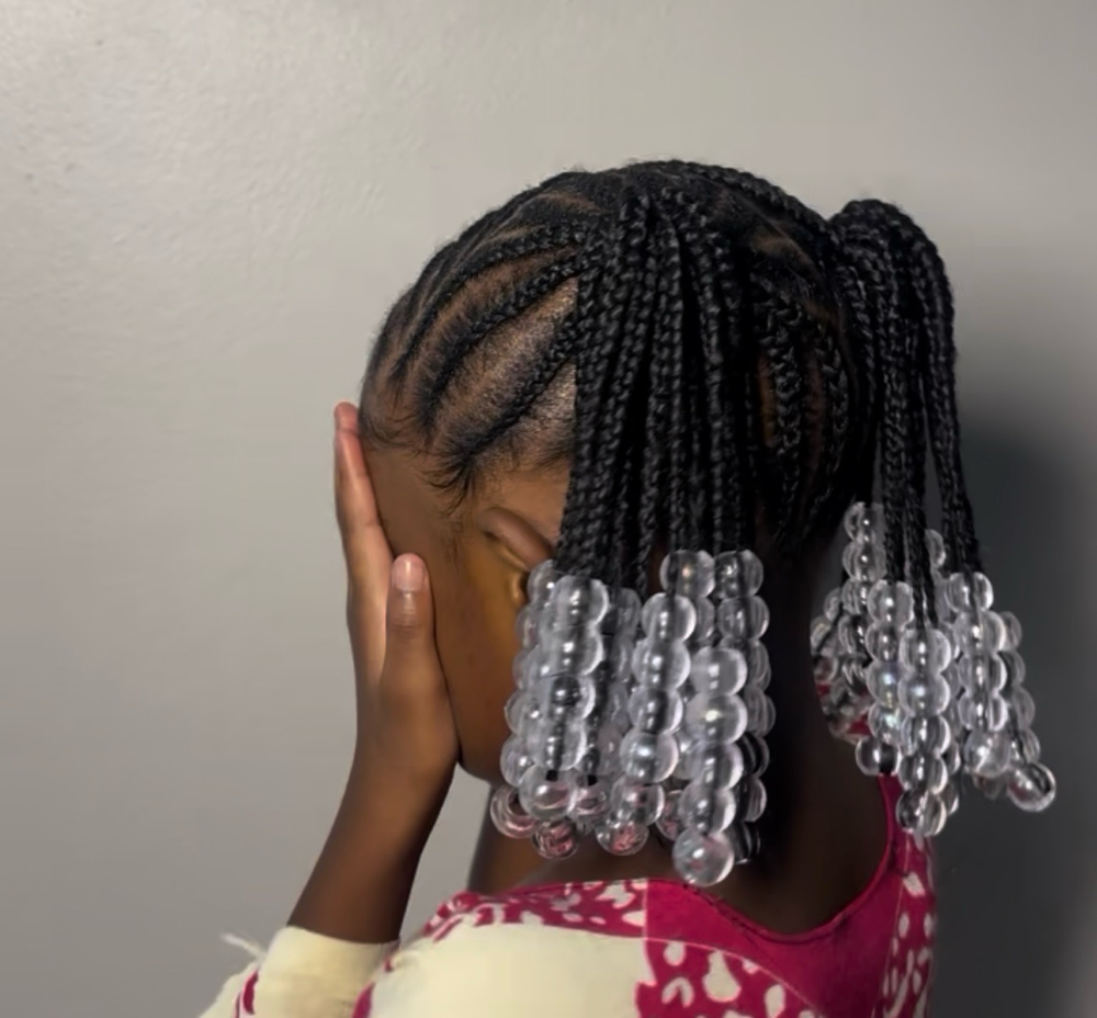 Simple Braided Ponytails /buns at Braids & Bows in Columbus, OH