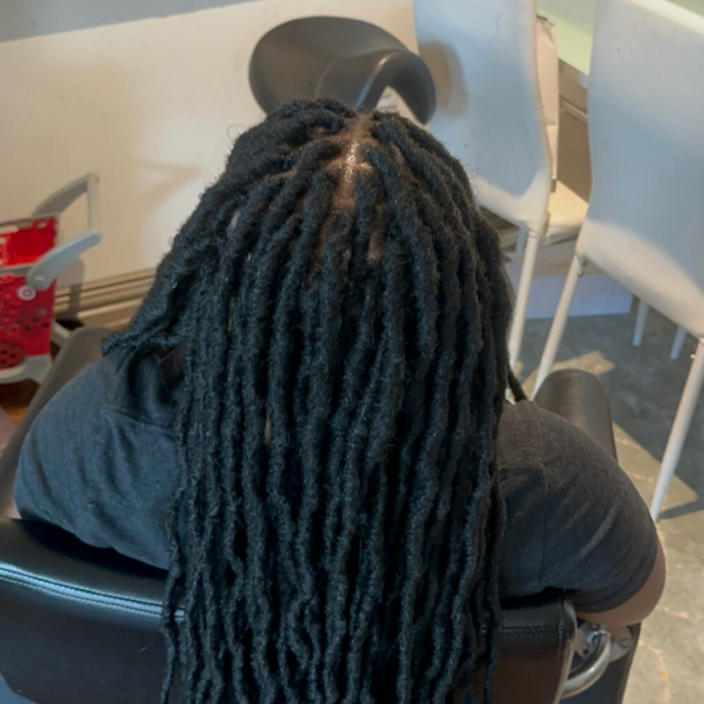 Faux Locs Installation at TEL Hair Braiding & Beauty Supply in Garland, TX